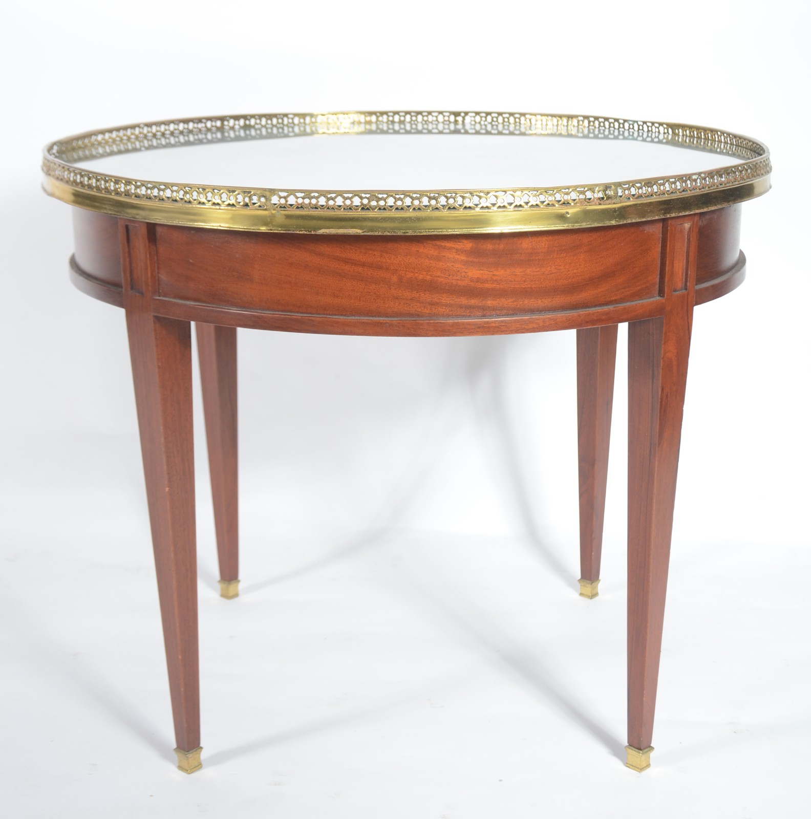 Mesa redonda de madeira nobre com galeria de bronze, pernas retas com... - foto 2 de 9