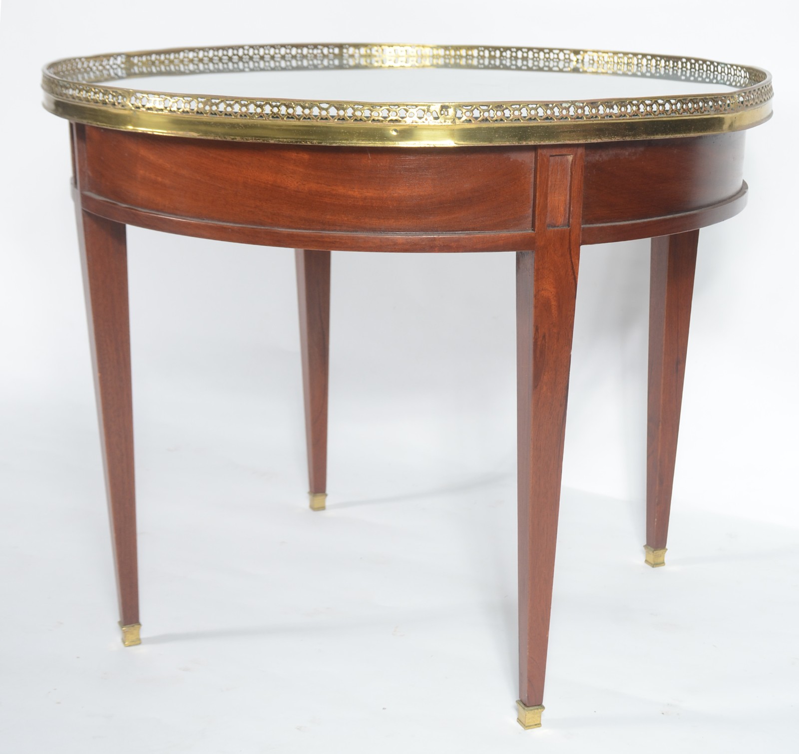 Mesa redonda de madeira nobre com galeria de bronze, pernas retas com... - foto 1 de 9