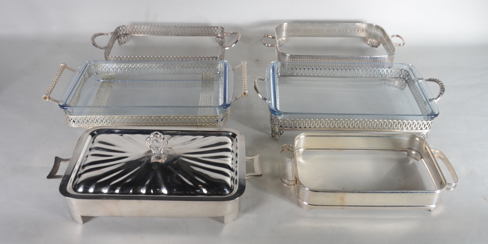 Seis porta pirex de metal prateado de diversos modelos. - foto 1 de 7