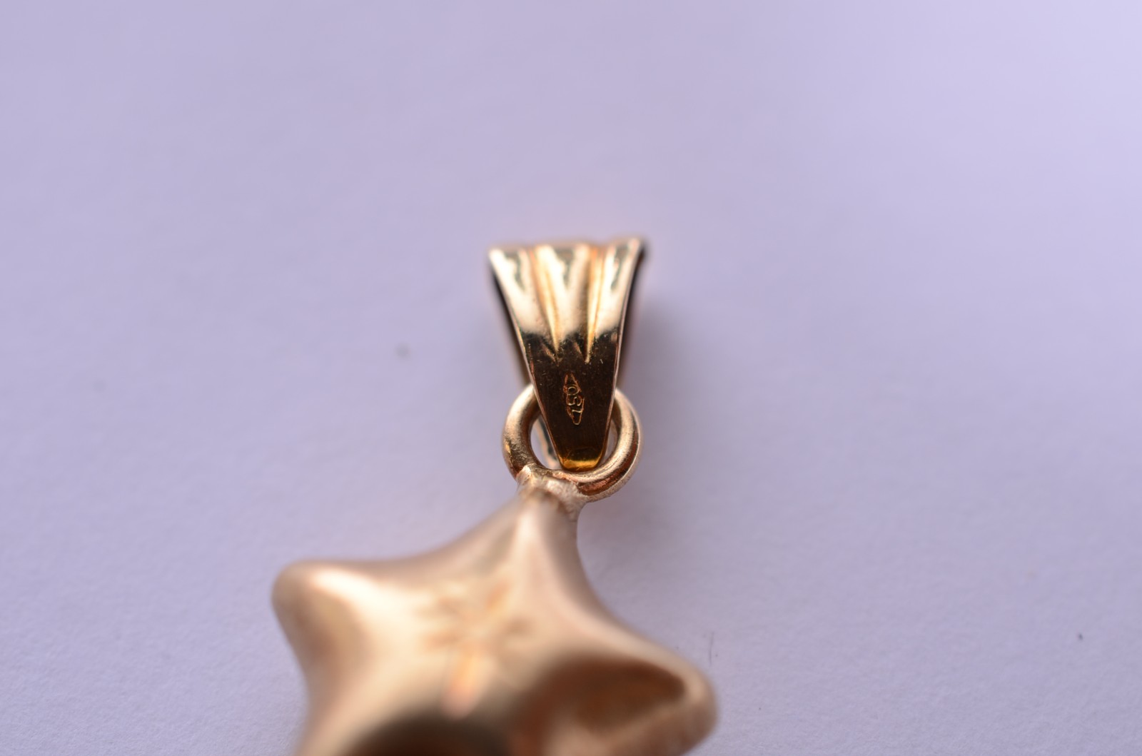 Pendente feitio estrela de ouro 18 k., contraste 750 mls. (Por... - foto 3 de 3