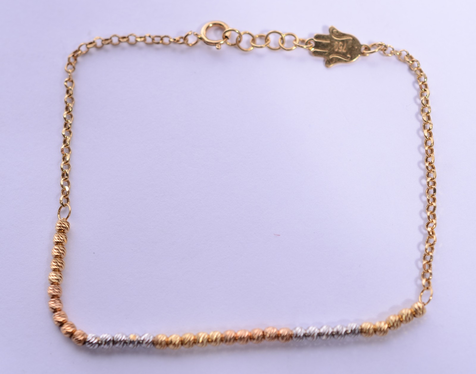 Pulseira em três tons de ouro, contraste 750 mls. (Por motivos de... - foto 2 de 7