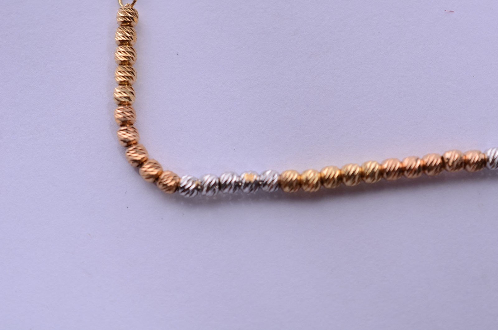 Pulseira em três tons de ouro, contraste 750 mls. (Por motivos de... - foto 3 de 7