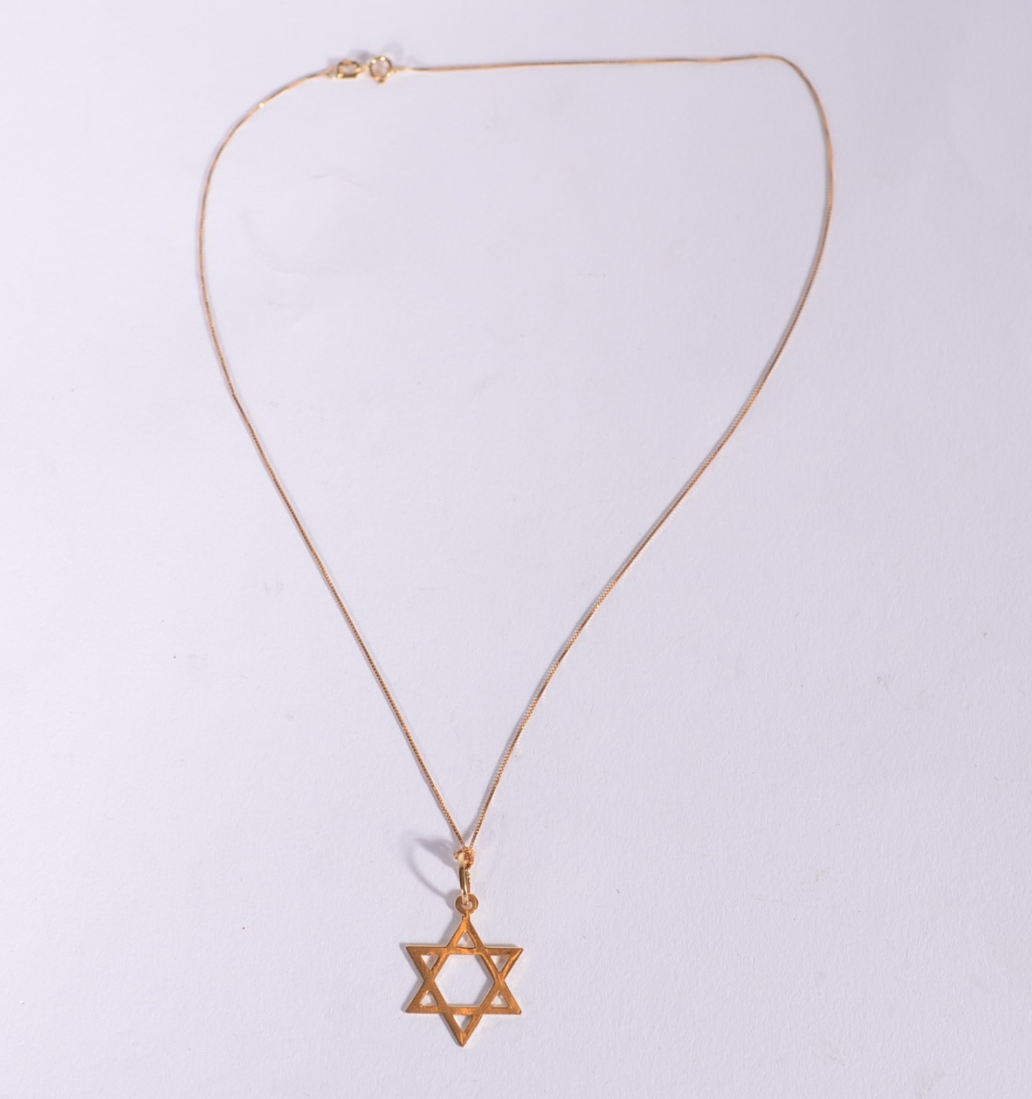 Colar de ouro 18k., contraste 750 mls com pendente "Estrela de... - foto 2 de 5