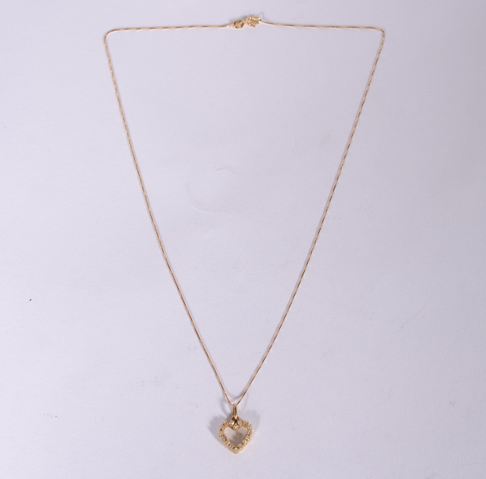 Colar de ouro 18 k., contraste 750 mls com pendente feitio coração... - foto 2 de 6