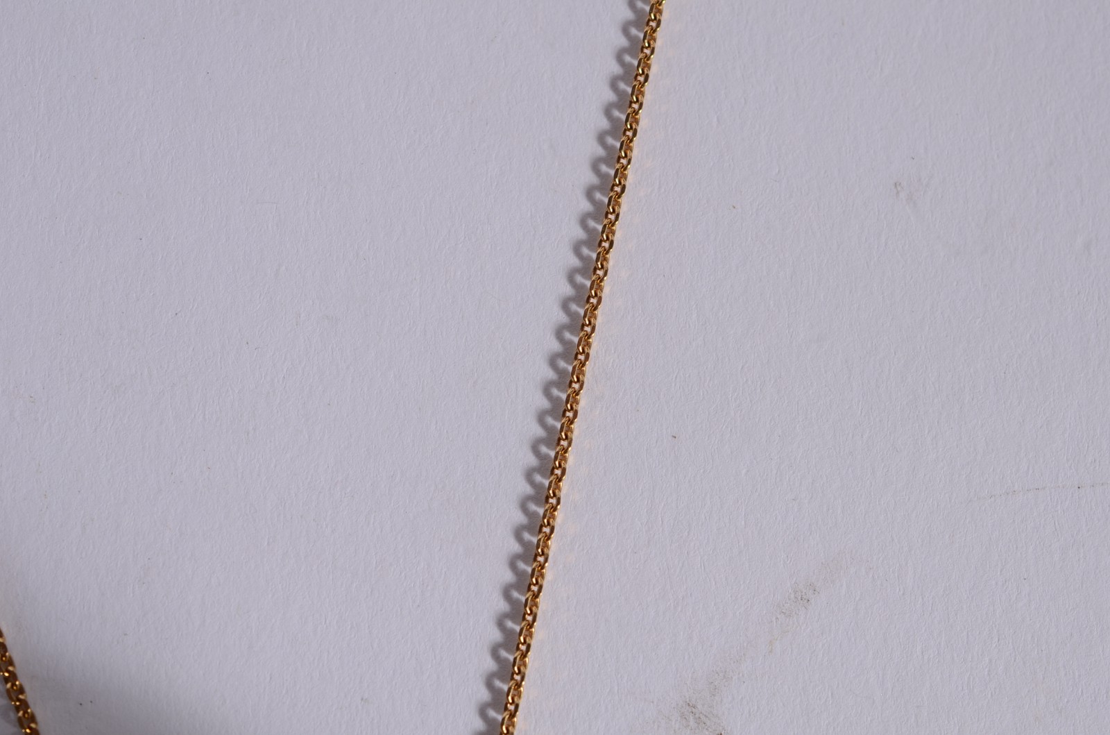 Colar de ouro 18 k., pendente de olho de gato. (Por motivos de... - foto 3 de 6
