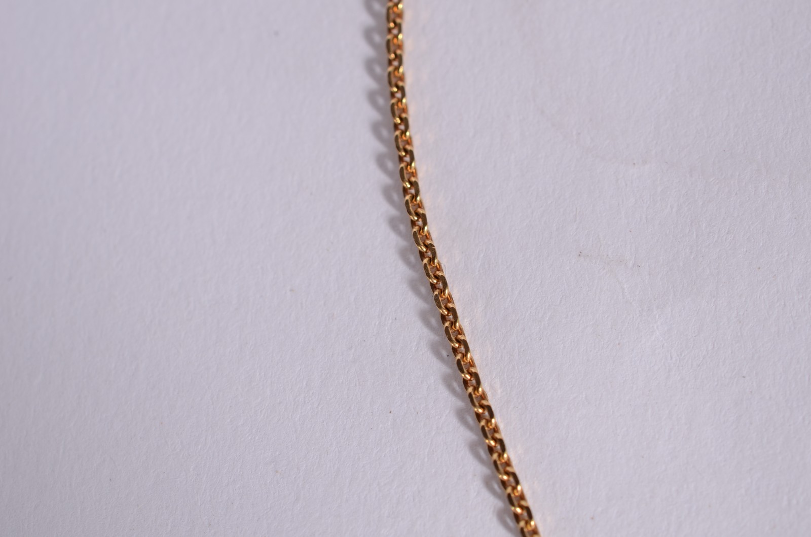 Colar de ouro 18 k., pendente de olho de gato. (Por motivos de... - foto 4 de 6