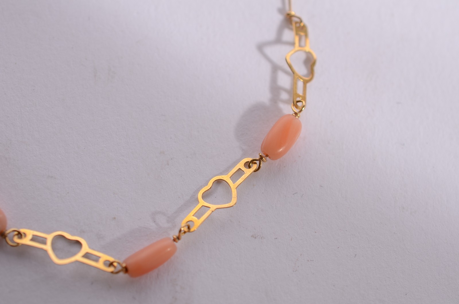 Pulseira de ouro 18 k., contraste 725 mls com pedras corais. (Por... - foto 2 de 4