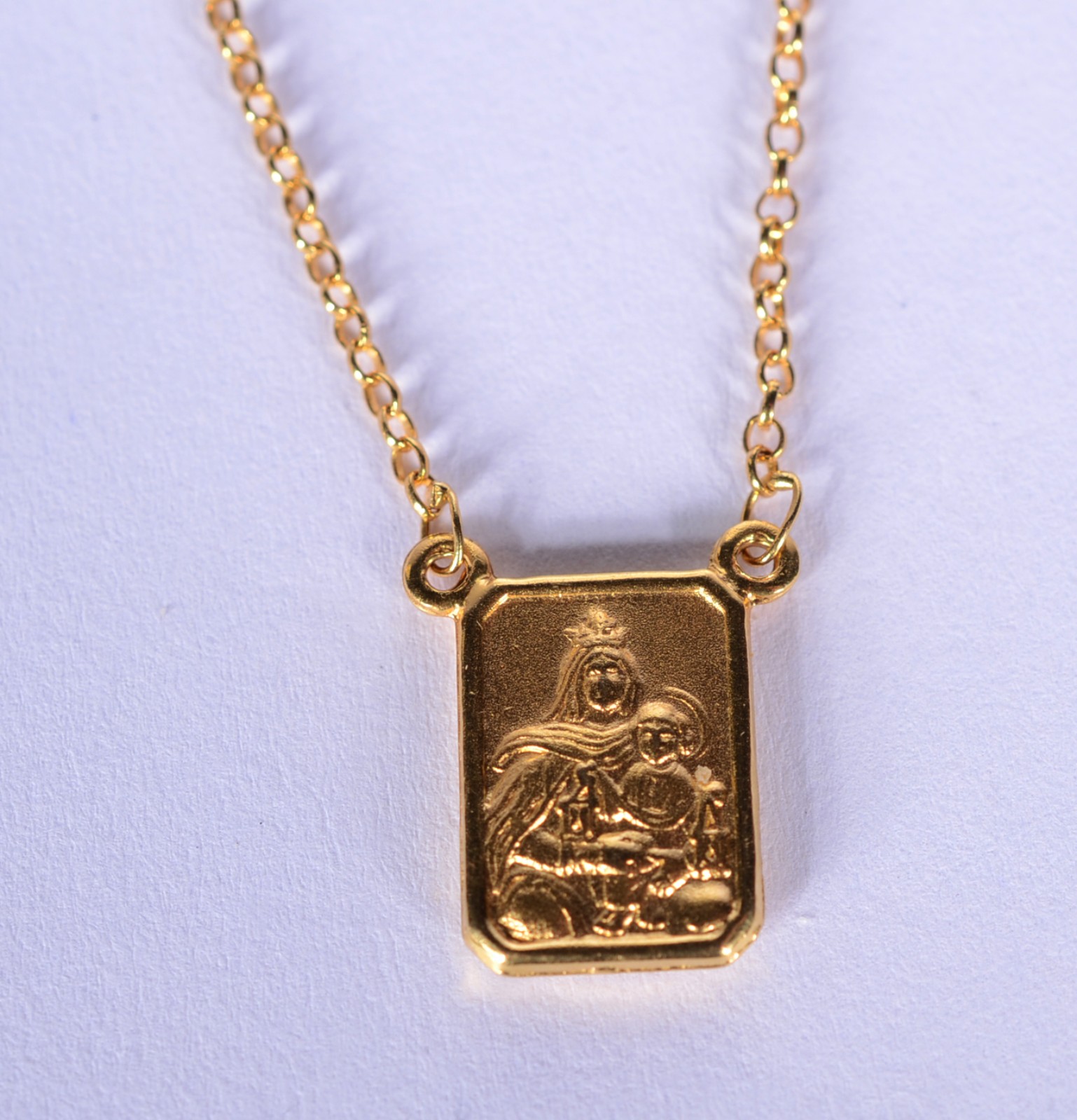 Colar com medalha de ouro 18 k., contraste 750 mls feitio elinhos e... - foto 5 de 10