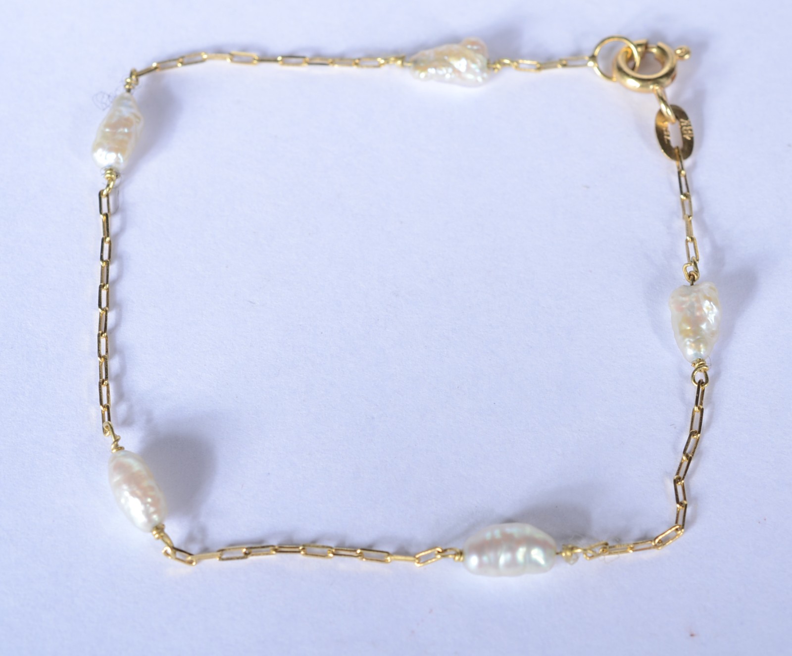 Pulseira de ouro 18 k., contraste 750 mls intercalados com pedras... - foto 1 de 5
