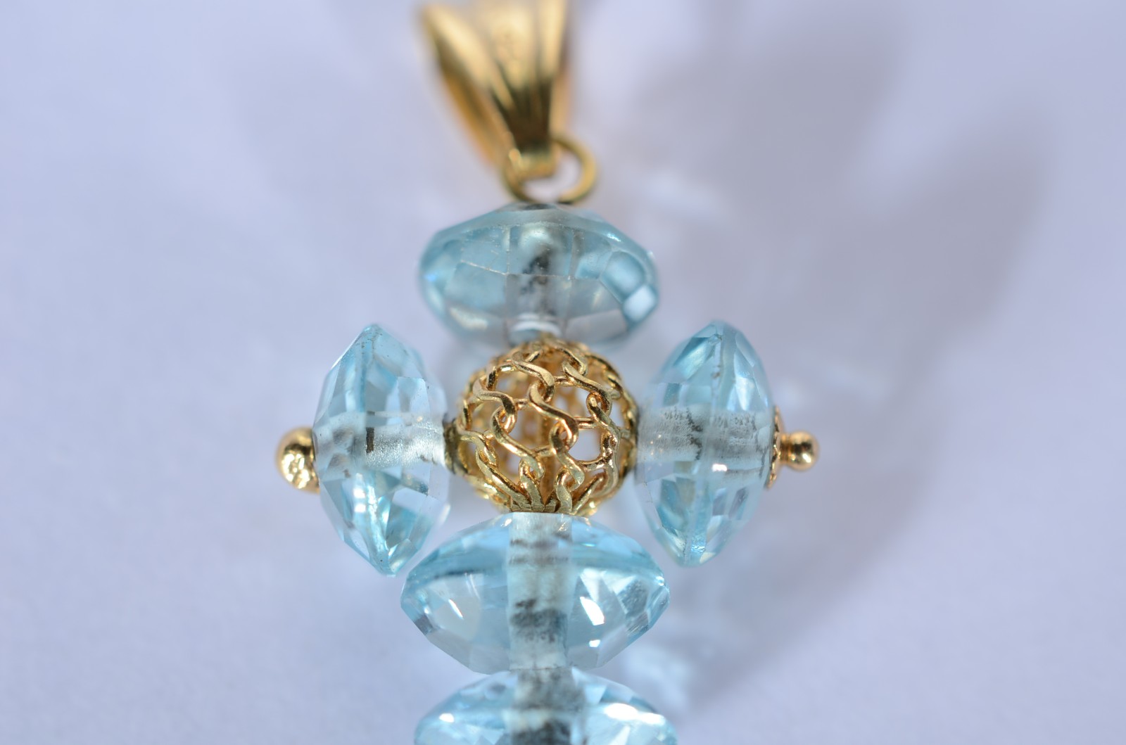 Pendente de ouro 18 k., contraste 750 mls na forma de cruz com pedras... - foto 5 de 5
