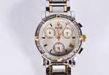 Bulova (1875),  - Relógio feminino de aço com 16 diamantes, á quartz com cronógrafo. No estojo e acompanha certificado.