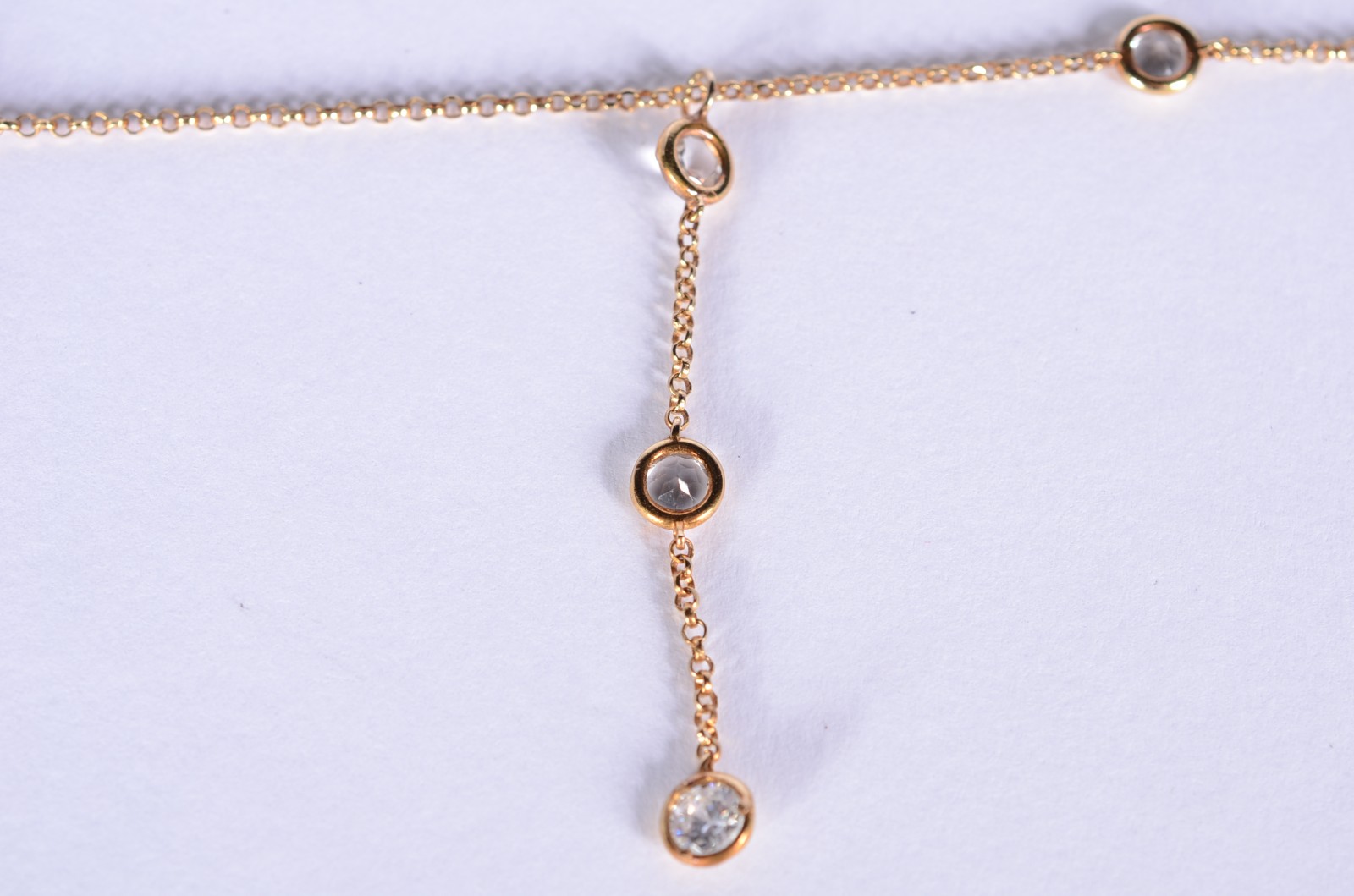 Colar de ouro 18 k., contraste 750 mls com 9 topázios branco. - foto 1 de 11
