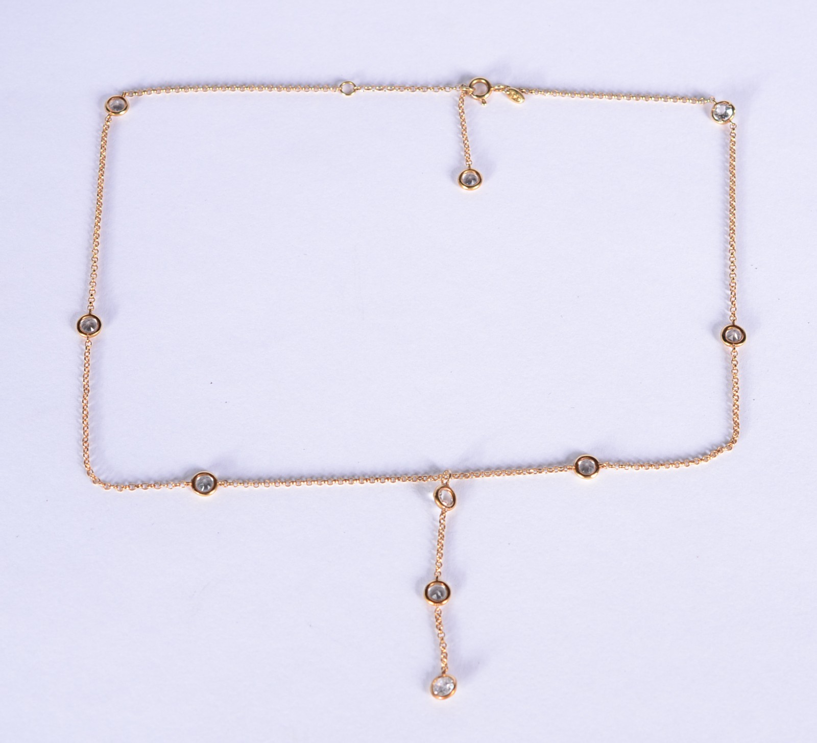 Colar de ouro 18 k., contraste 750 mls com 9 topázios branco. - foto 2 de 11