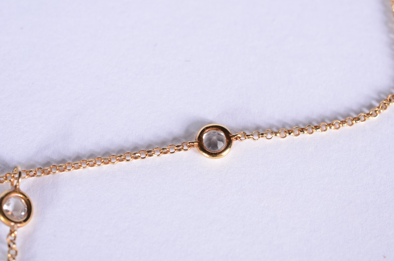 Colar de ouro 18 k., contraste 750 mls com 9 topázios branco. - foto 7 de 11