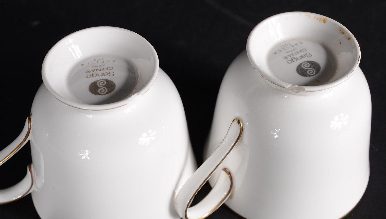 Serviço de jantar de porcelana Sango, composto de: 16 pratos rasos... - foto 10 de 11