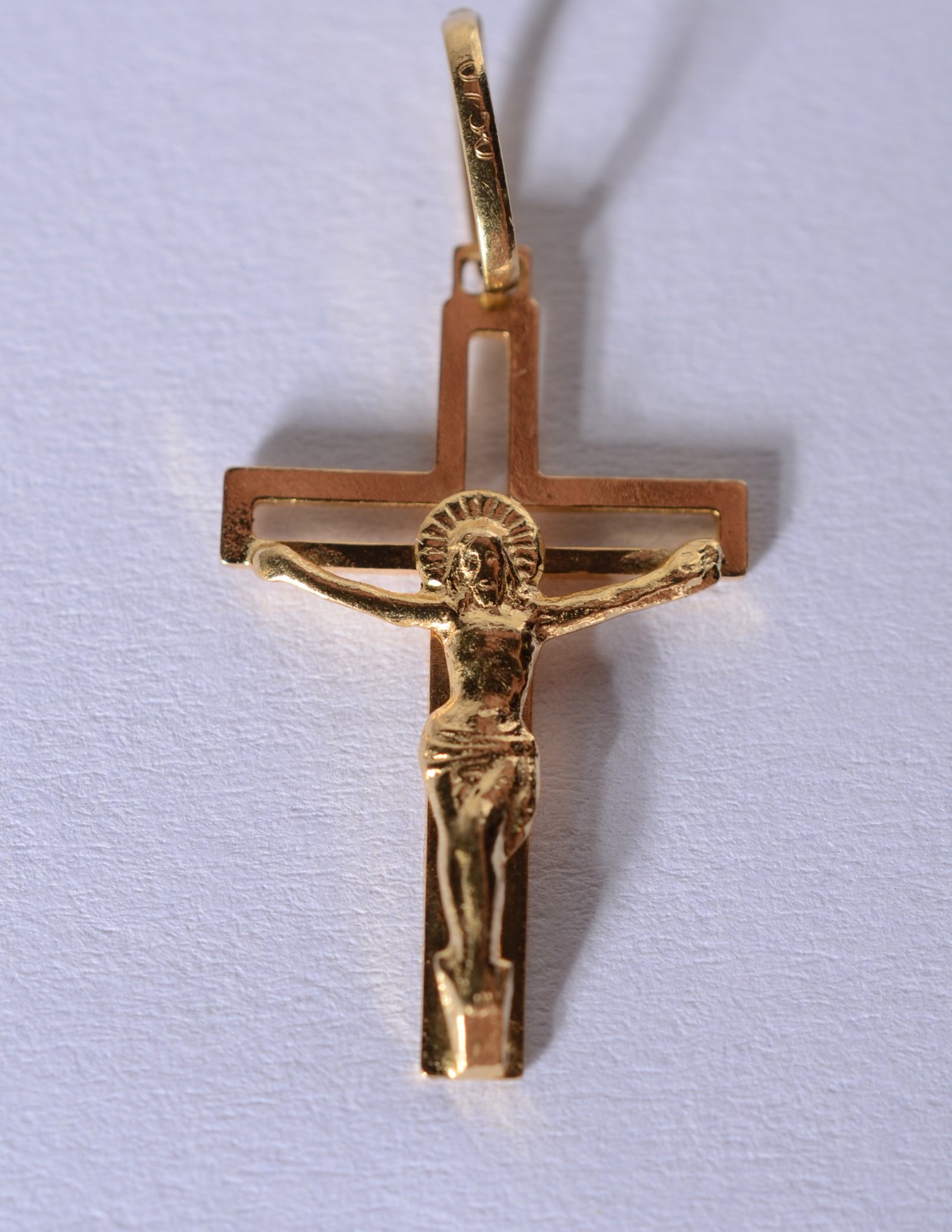 Crucifixo de ouro 18 k., contraste 750 mls. (Por motivos de segurança... - foto 1 de 4