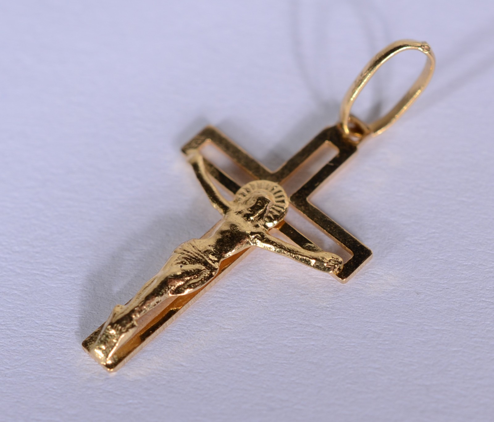 Crucifixo de ouro 18 k., contraste 750 mls. (Por motivos de segurança... - foto 2 de 4