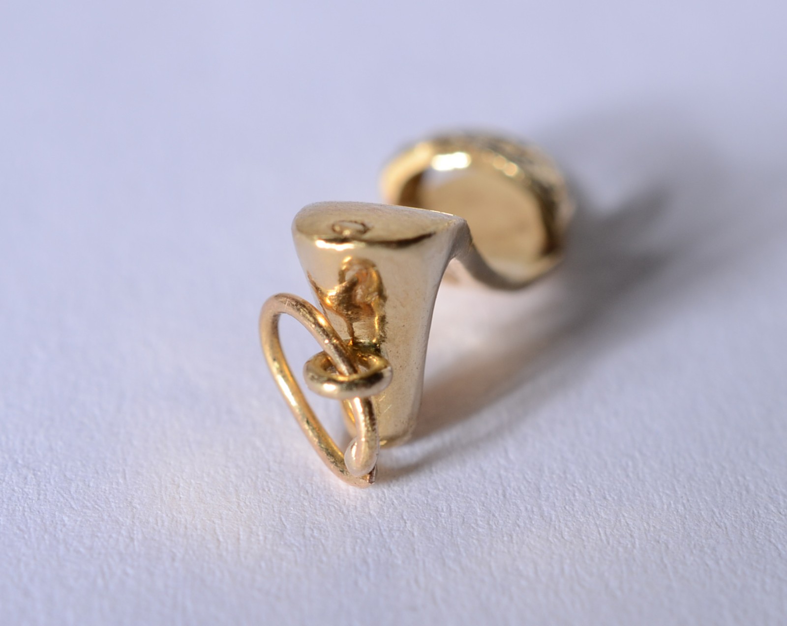 Pendente feitio sapato de ouro 18 k., contraste 750 mls. (Por motivos... - foto 5 de 7