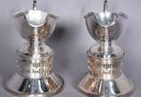 Wolff (1894),  - Par de molheiras com rechaud de metal prateado Wolff. Com desgastes.