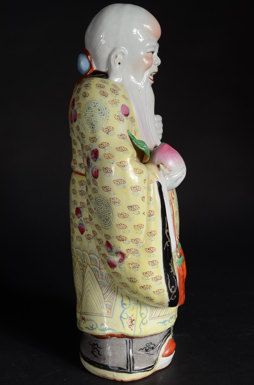 Escultura de porcelana oriental policromada representando Buda. - foto 2 de 9