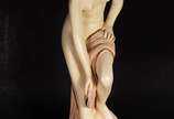 Escultura de estuque policromado representando ... - Escultura de estuque policromado representando figura feminina.