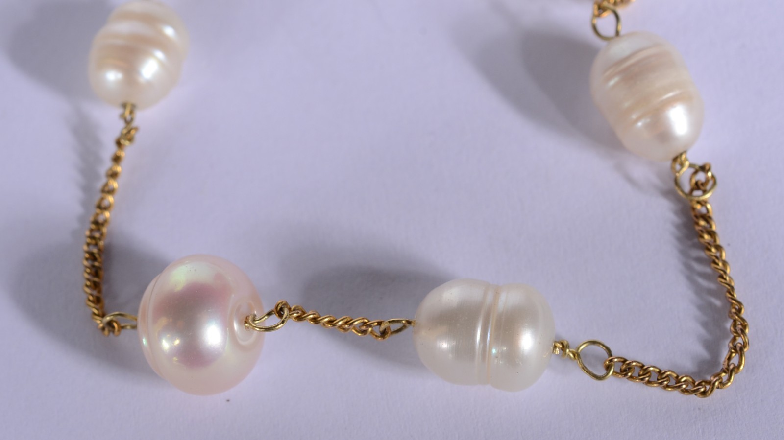 Pulseira de ouro 18 k., contraste 750 mls com cinco perolas... - foto 5 de 5