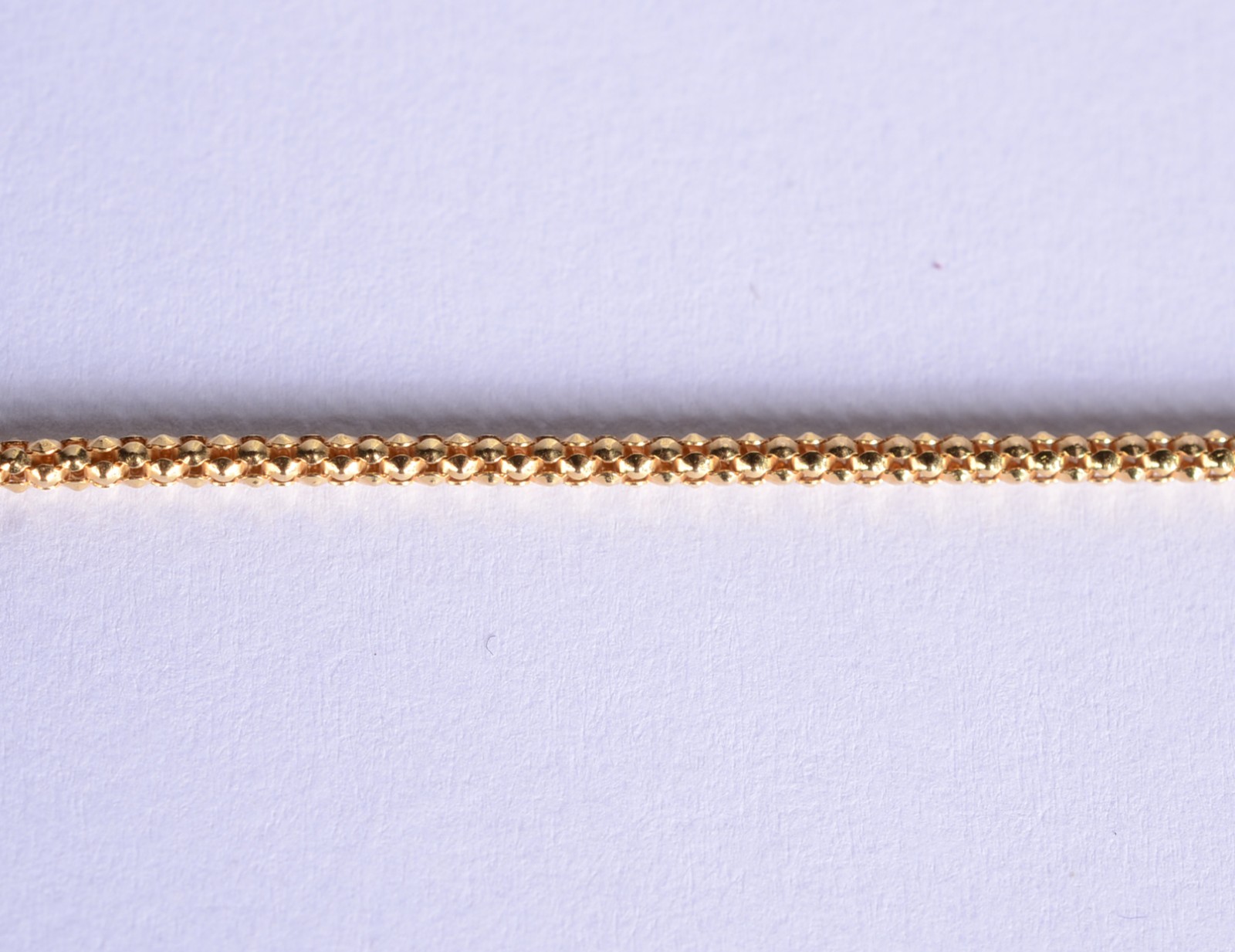 Colar de ouro 18 k., contraste 750 mls, malha com escamas. (Por... - foto 1 de 5