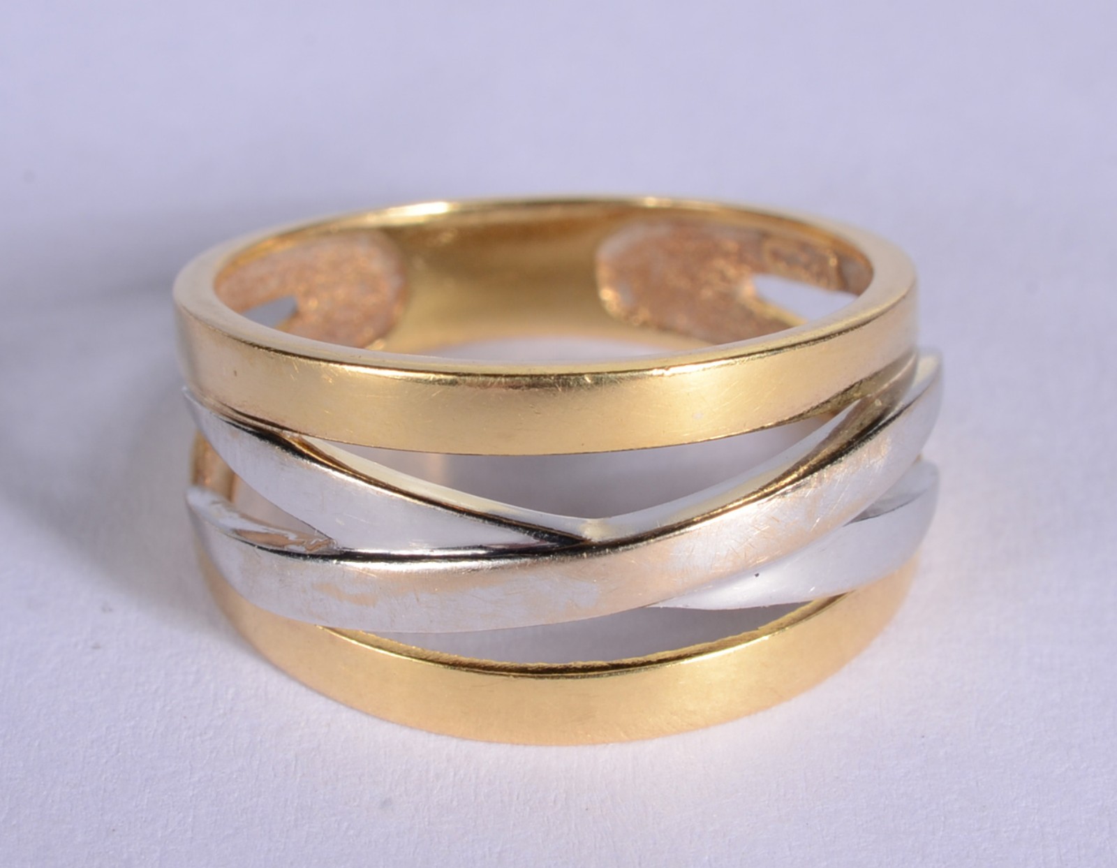 Anel de ouro 18 k., contraste 750 mls feitio "X" em ouro branco, aro... - foto 1 de 7