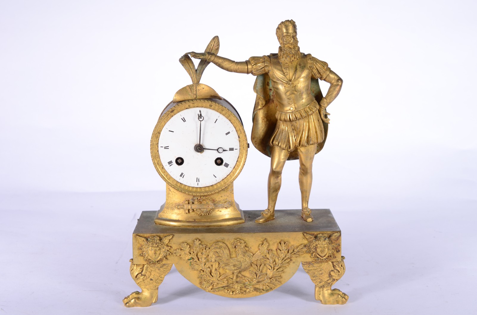 Relógio de mesa de metal dourado ornamentado com figura masculina com... - foto 1 de 8