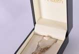 HStern (1945),  - Coleção Rock Season - Colar de ouro 18 k. com pendente na forma de coruja com aproximadamente 79 diamantes.