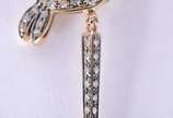 HStern (1945),  - Coleção Rock Season - Colar de ouro 18 k. com pendente na forma de coruja com aproximadamente 79 diamantes.