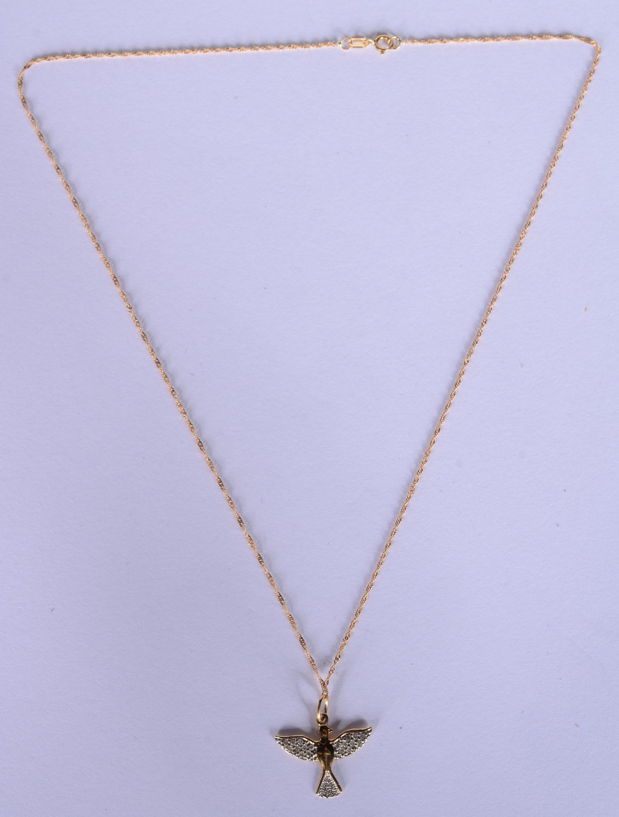 Colar com pendente na forma de Pomba da Paz de ouro 18 k., contraste... - foto 2 de 7