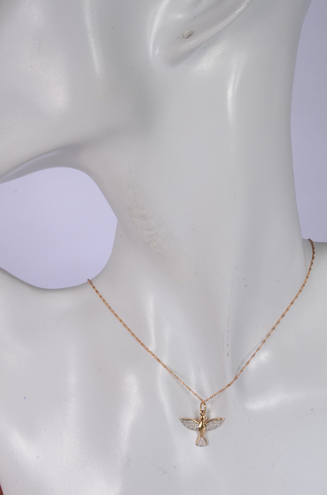 Colar com pendente na forma de Pomba da Paz de ouro 18 k., contraste... - foto 7 de 7