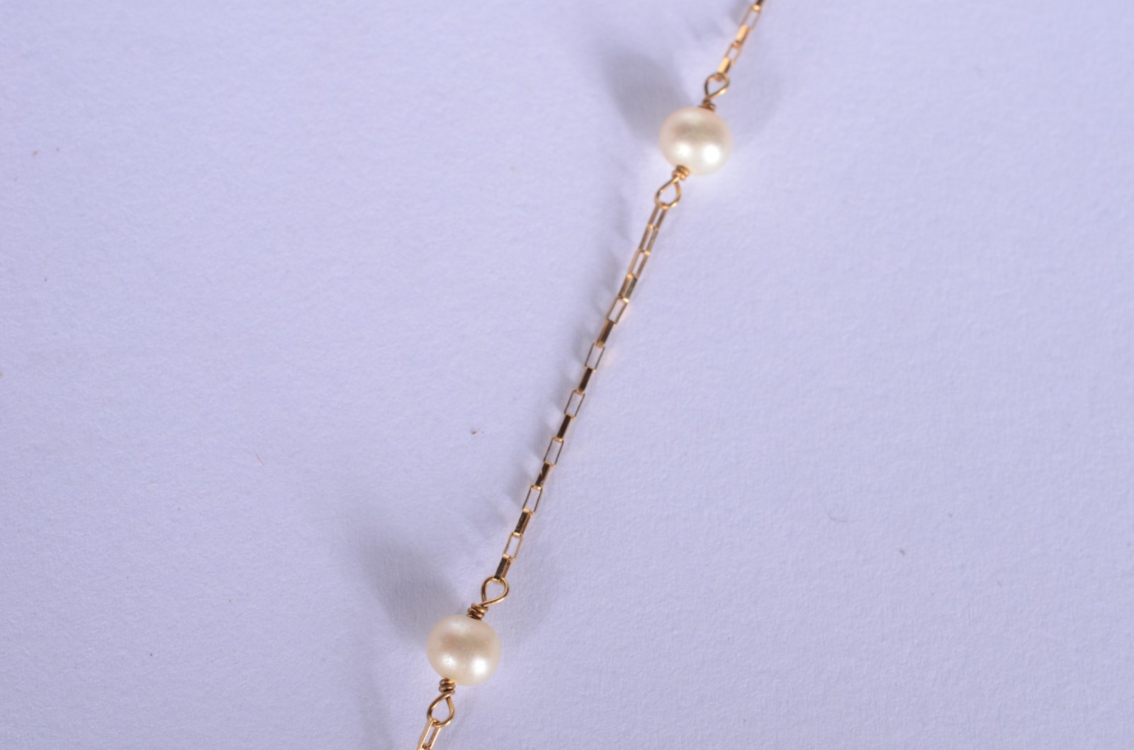 Colar de ouro 18 k., contraste 750 mls, malha com élinhos e 10... - foto 3 de 6