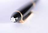 Montblanc (1906),  - Caneta Meisterstuck tinteiro na cor preta com dourado, pena 14 k., modelo 146.