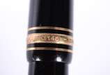 Montblanc (1906),  - Caneta Meisterstuck tinteiro na cor preta com dourado, pena 14 k., modelo 146.