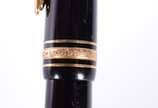 Montblanc (1906),  - Caneta Meisterstuck tinteiro na cor preta com dourado, pena 14 k., modelo 146.