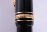 Montblanc (1906),  - Caneta Meisterstuck tinteiro na cor preta com dourado, pena 14 k., modelo 146.