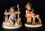 GOEBEL,  - Par de estatuetas de porcelana alemã Goebel.