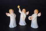 GOEBEL,  - Três estatuetas de porcelana alemã Goebel representando anjos.