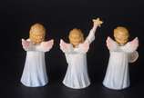 GOEBEL,  - Três estatuetas de porcelana alemã Goebel representando anjos.