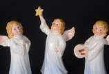 GOEBEL,  - Três estatuetas de porcelana alemã Goebel representando anjos.