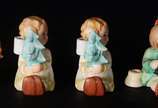 GOEBEL,  - Quatro estatuetas de porcelana alemã Goebel.