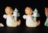 GOEBEL,  - Quatro estatuetas de porcelana alemã Goebel.