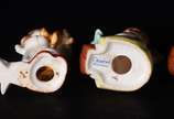 GOEBEL,  - Quatro estatuetas de porcelana alemã Goebel.