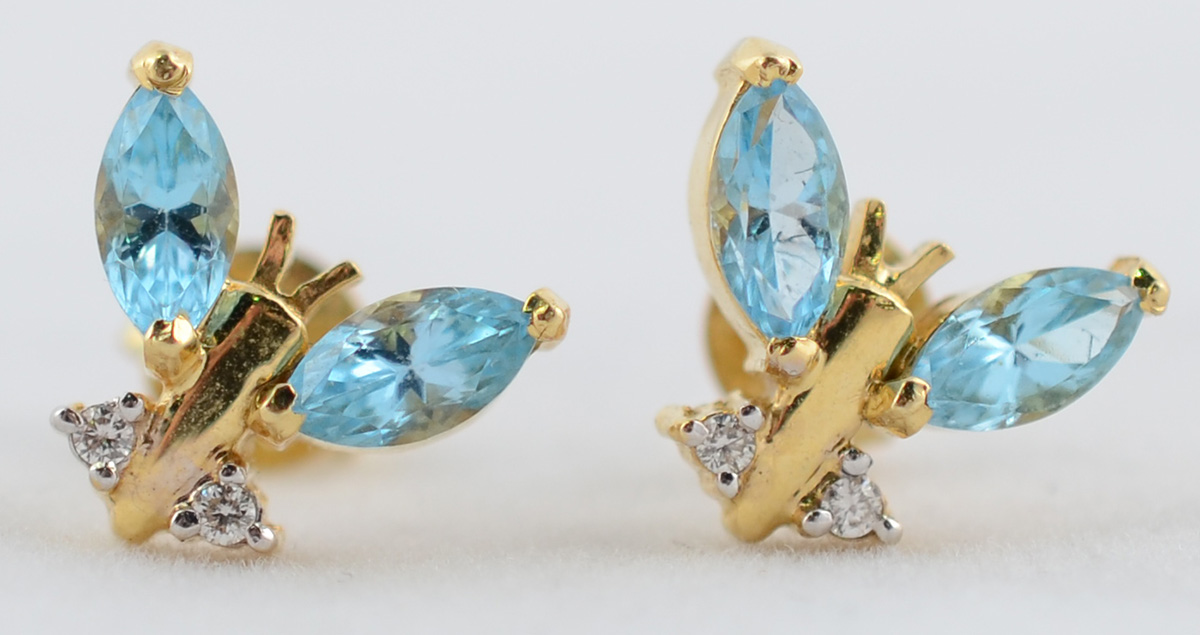 Par de brincos de ouro amarelo 18 k com 4 brilhantes e pedras...