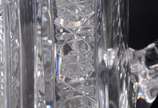 Duas peças de cristal europeu lapidado, sendo: ... - Duas peças de cristal europeu lapidado, sendo: jarra para água e vaso floreira. Jarra com lascados na base.