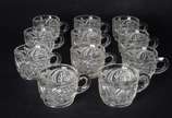 Grande fruteira/poncheira de cristal lapidado c... - Grande fruteira/poncheira de cristal lapidado com borda recortada, acompanham 11 canecas.