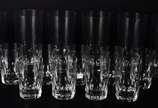 Conjunto com 6 copos longos e 9 copos para bati... - Conjunto com 6 copos longos e 9 copos para batida de cristal com bases facetadas. Total: 15 peças.