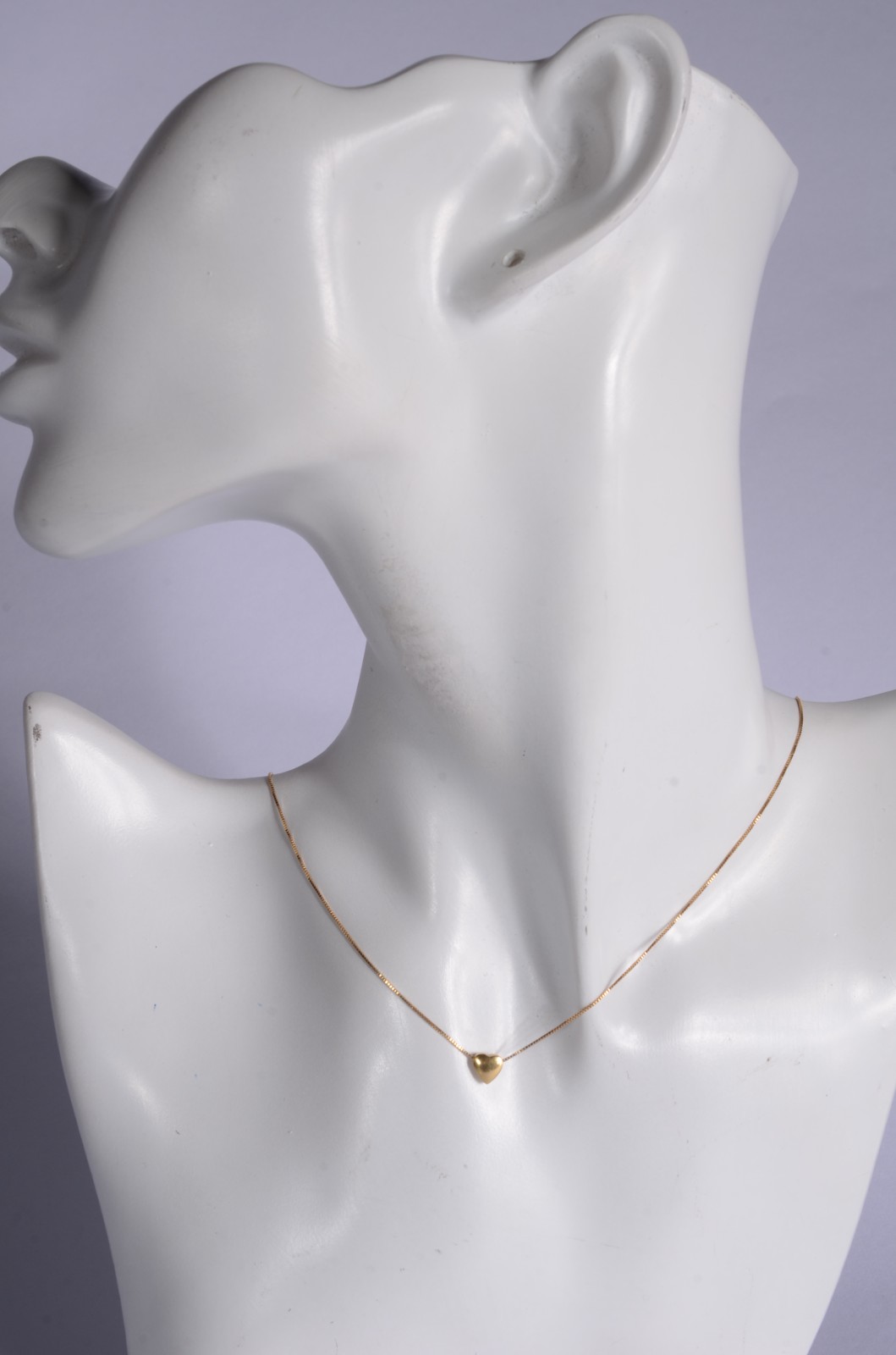 Colar com pendente na forma de coração de ouro 18 k., contraste 750... - foto 4 de 5